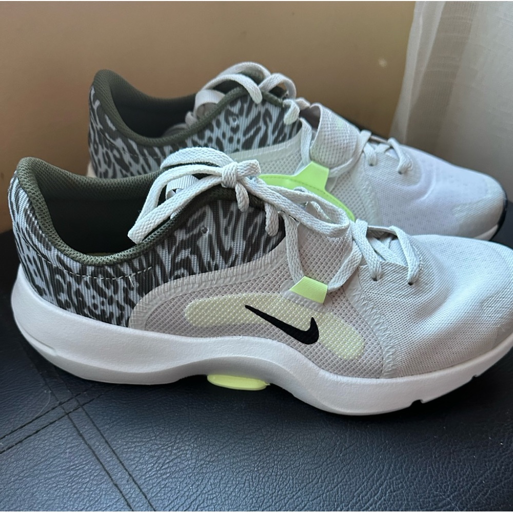 New Nike sneakers never worn white with green and animal print accents